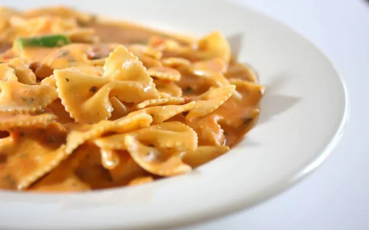 A bowl is filled with pasta.