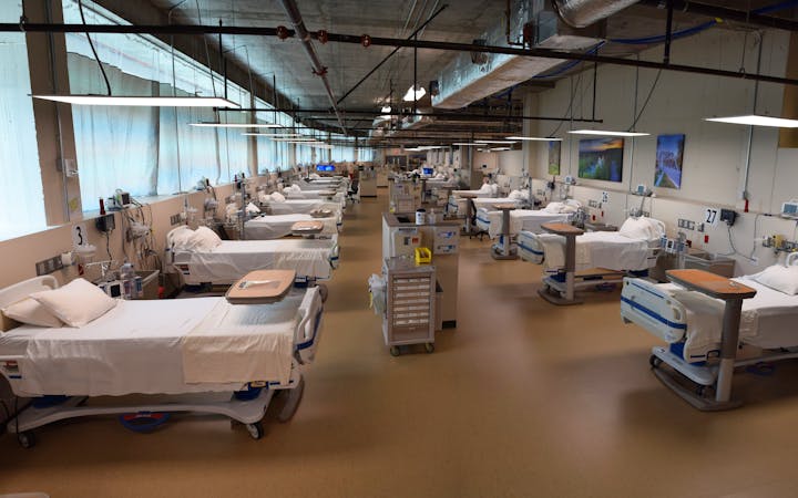 A photo shows the interior of the COVID-19 unit at Cox South.