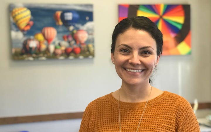 A photo shows Dr. Charlotte McKnight.