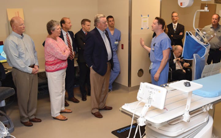 A group tours a new EP lab at Cox South.