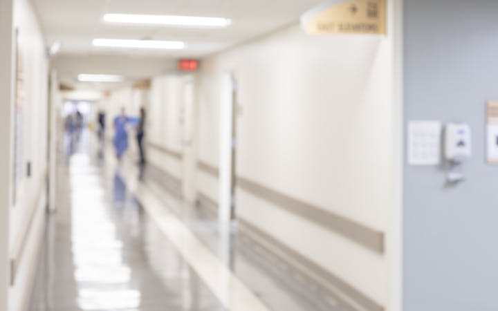 An image shows hallways at Cox South.