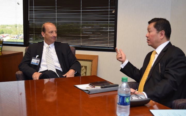 MU President talks with Cox Health leaders.