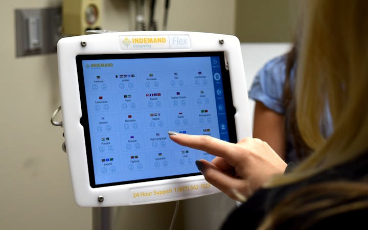 Cox Health employee using an ipad.