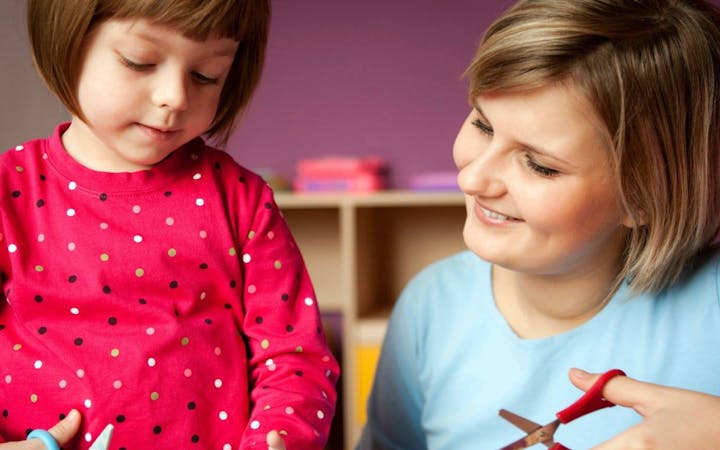 Mom and daughter sewing